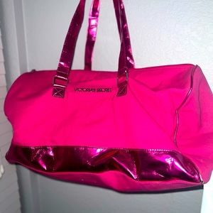 Bright pink Victoria’s Secret duffel
